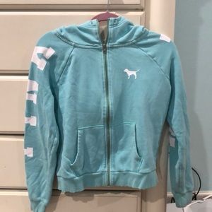 The brand pink jacket in the color blue